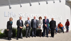 The IU delegation outside the Life Sciences Building at the University of the Western Cape. Members were joined by Dean of Research Renfrew Christie, center, and Premesh Lalu, right, who is Director of the Centre for Humanities Research. 