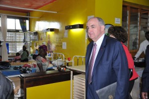 IU President Michael McRobbie tours a medical ward at Moi Teaching and Referral Hospital. 