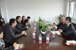 Members of the IU delegation meet with their counterparts at Peking University's School of New Media.