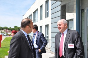 IU President Michael McRobbie, right, meets with Eric Ballet, president and general manager of Lilly Italy. 