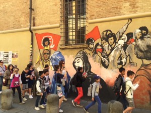 Movements of student protest have been a constant in Bologna, an active atmosphere reflected in the campus' central street, Via Zamboni. 
