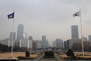 Flags flying outside of South Korea's National Assembly Building. 