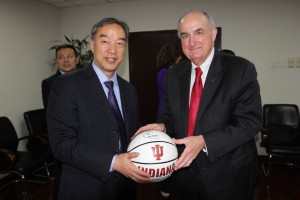 Beijing Normal University Professor Liu Baocun and IU President Michael A. McRobbie pose for a picture after formalizing a longstanding partnership between their respective universities. 