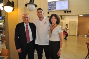 IU President Michael McRobbie and First Lady Laurie McRobbie pose for a picture at the Istanbul airport with former IU basketball standout Will Sheehey (center).  
